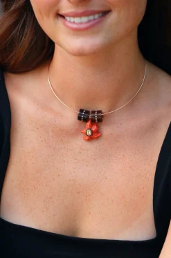 Carved Coral Starfish with Yellow Sapphire