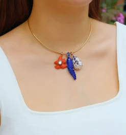 Carved Coral Starfish with Yellow Sapphire