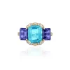 3 Stone Emerald Cut Blue Topaz & Tanzanite Ring